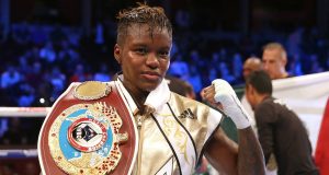 China Wins Historic Double Boxing Gold Nicola Adams standing in front of a crowd