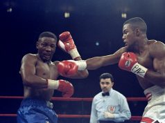 Jose Torres: Puerto Rican Boxing Legend Pernell Whitaker standing in front of a crowd