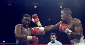 Jose Torres: Puerto Rican Boxing Legend Pernell Whitaker standing in front of a crowd