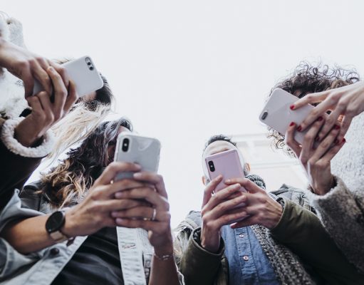 Definition Of Followers Is Quite Simple And Understandable A group of people looking at a cell phone