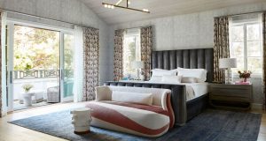 Follow Simple Tips on Bedroom Design Ideas A living room with a bed and a large window