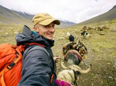 Best Travel Guide Is Available Here A man riding on top of a mountain