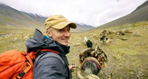 Best Travel Guide Is Available Here A man riding on top of a mountain