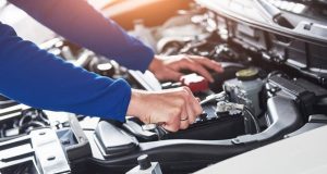 5 Tips To Consider While Buying Mazda Car Spare Parts A person sitting in a car